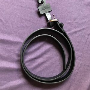 Simple black belt with silver buckle